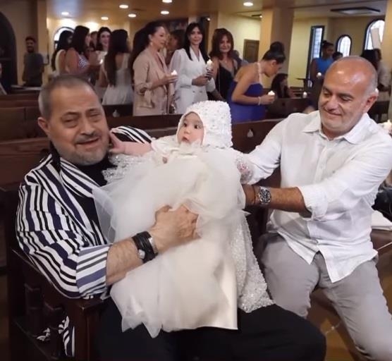 ظهور نادر ل جورج وسوف مع حفيدته خلال مراسم تعميدها بأحدى الكنائس 1 تعميد حفيدة جورج وسوف