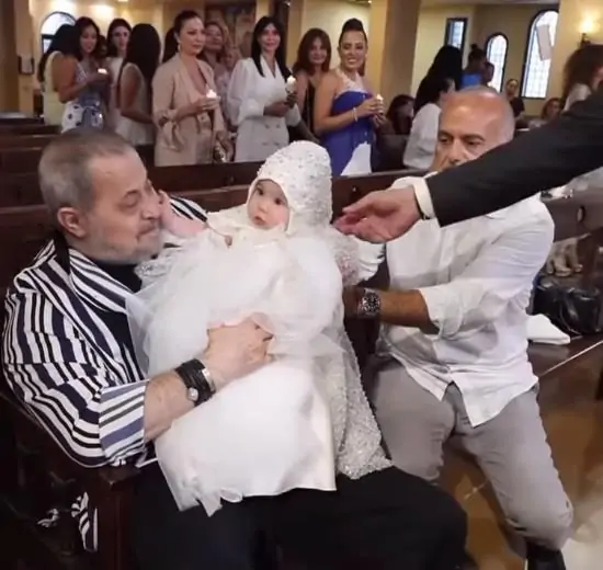 ظهور نادر ل جورج وسوف مع حفيدته خلال مراسم تعميدها بأحدى الكنائس 2 تعميد حفيدة جورج وسوف