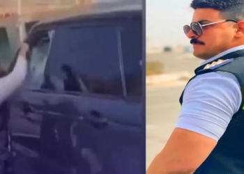 بطولة فوق كوبري أكتوبر ضابط مرور يمنع كارثة السيارة الفارهة ويكسر الزجاج بيده 6 ضابط كوبري أكتوبر