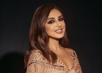 بالصور الفنانة أنغام بعد فوزها بجائزة حفل جوي بفستان فضي أووردز الرقى والجرأة 7 الفنانة أنغام بعد فوزها بجائزة حفل جوي